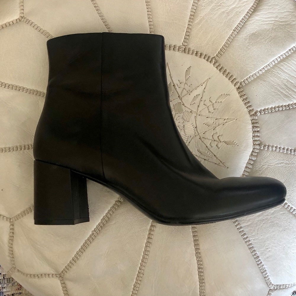 Naturalized black leather boots size 11